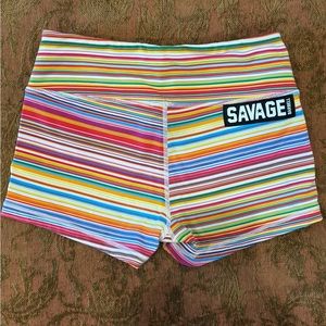 Multiple colored striped Savage workout shorts.